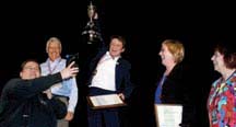 Speaking champion: Claude Poumerol cheering at having won the District 21 Toastmasters International Speech Competition in Whistler, BC.